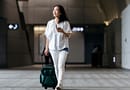 Woman with Luggage bag in airport