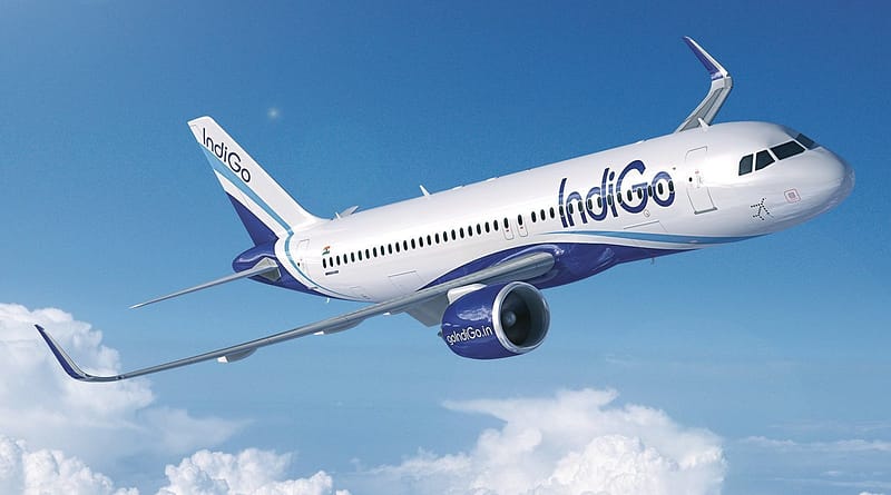 Indigo A320 against a blue sky